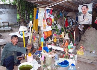 Sangworn Liemgpheng works to restore broken religious figurines.
